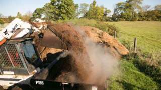 Loading 185 PTO Manure Spreader