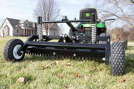 Stabilizing Wheels on ABI gravel grader